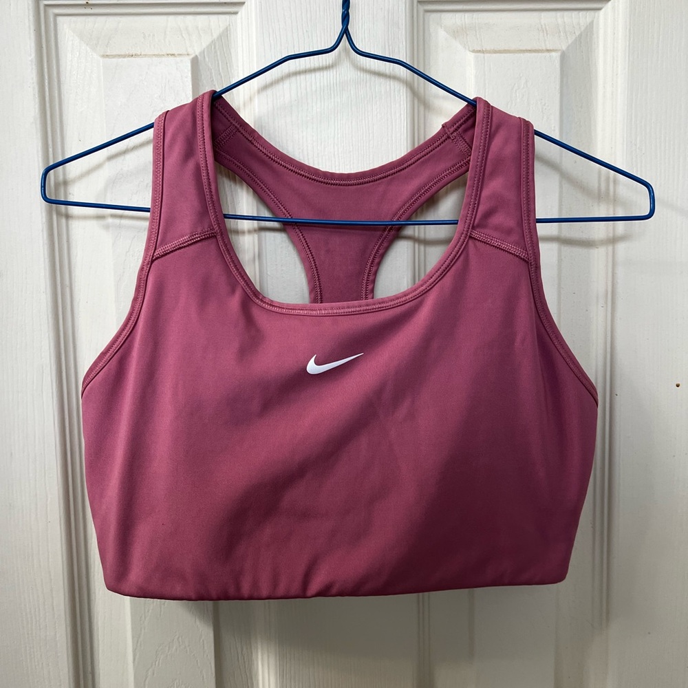 Nike Dri-Fit Women’s Rosewood/white large razorback sports bras.